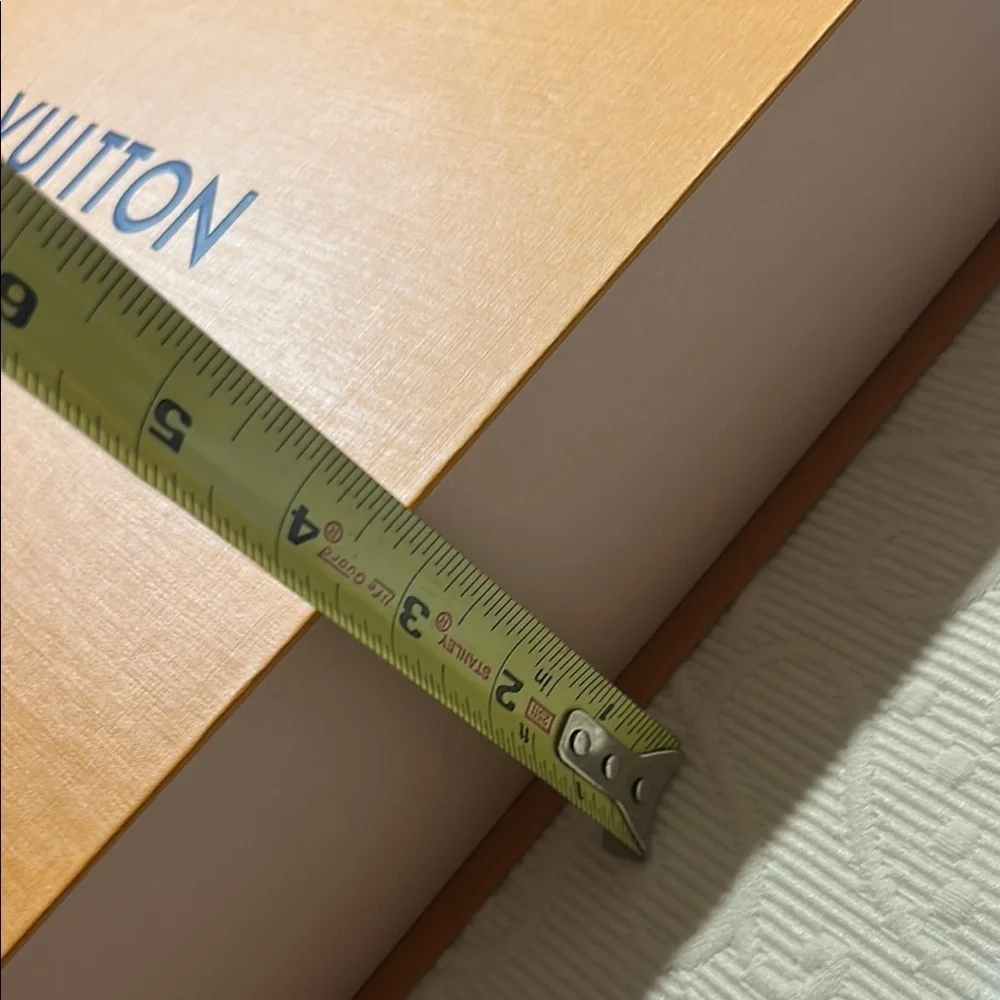 Louis Vuitton Signature  Box inside a LV shipping box with tissue and ribbon.